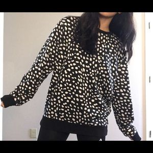 Spotted sweater. Edgy.